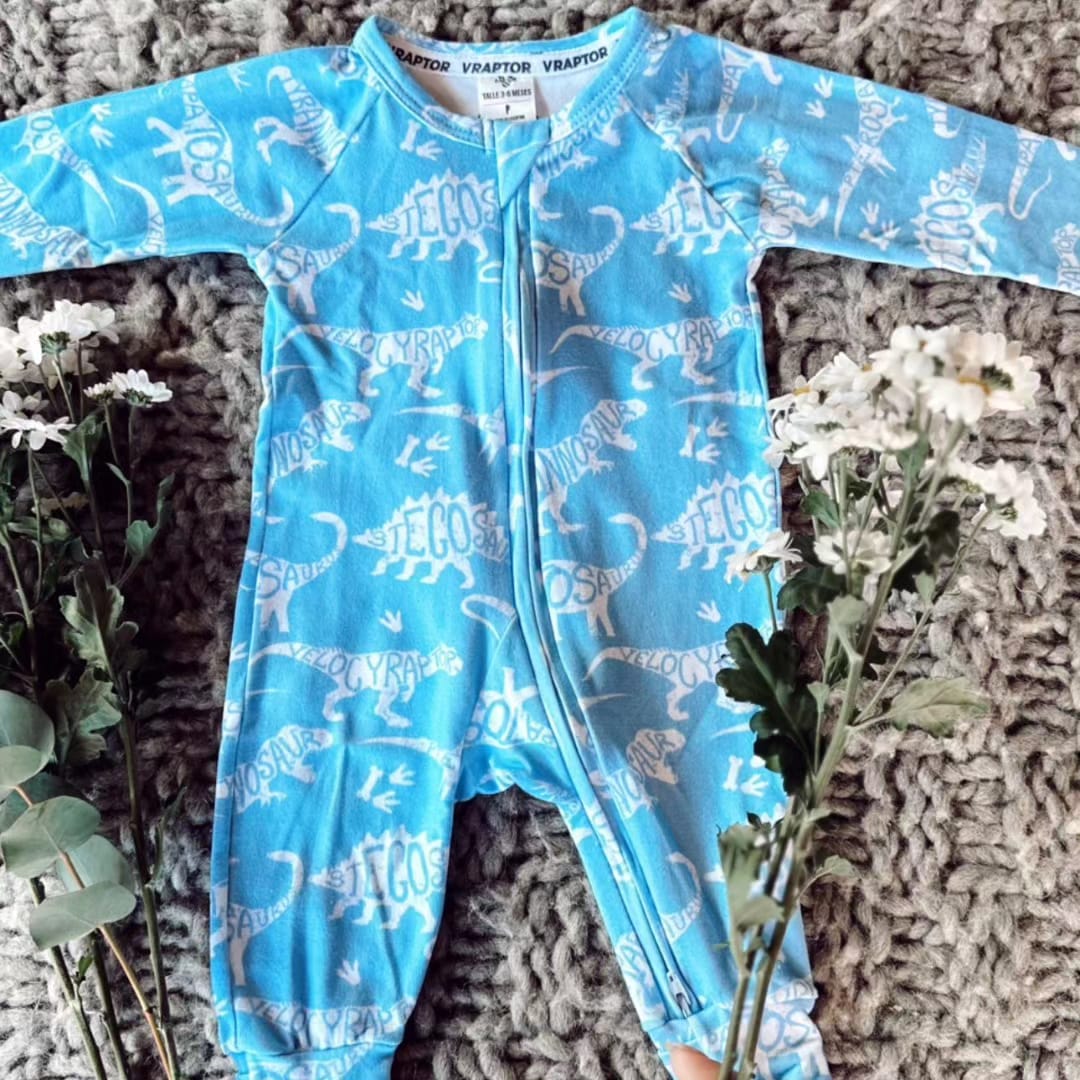 Osito pijama dino celeste